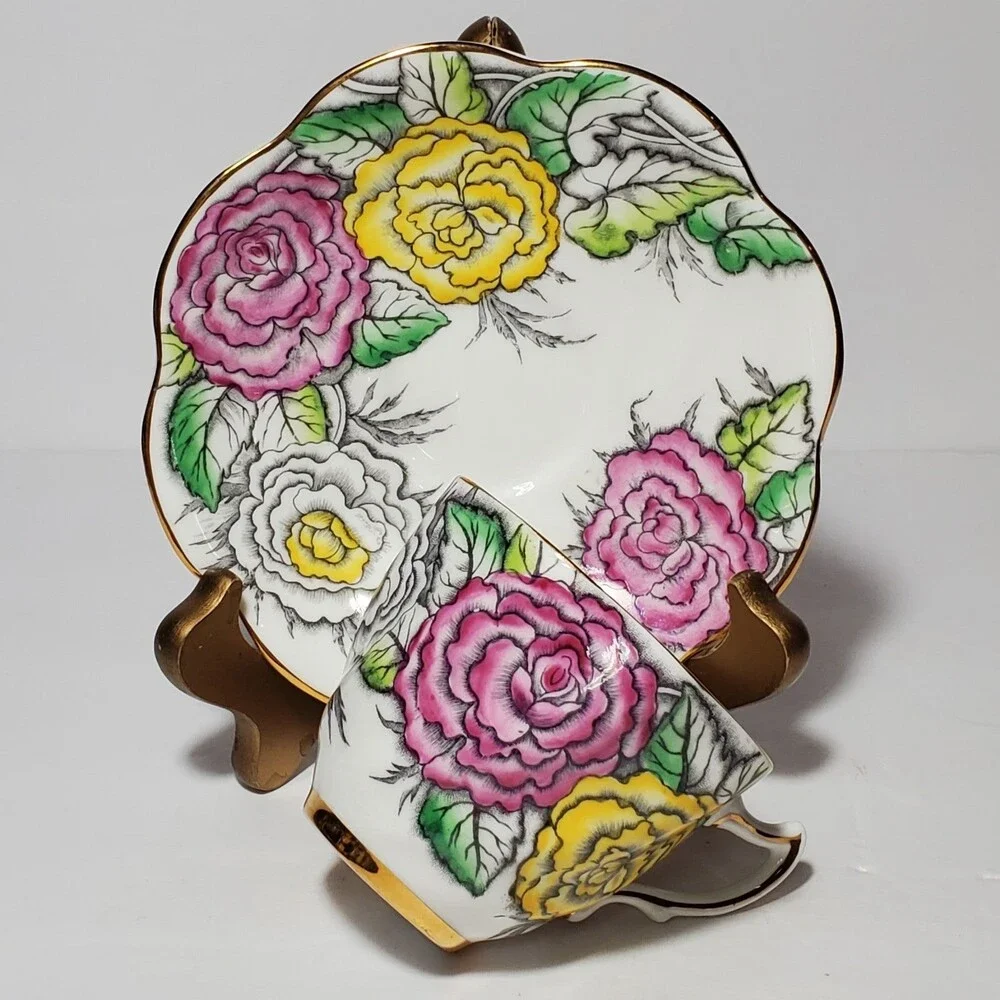 Rosina Teacup and Saucer Floral Pink Yellow White Vintage